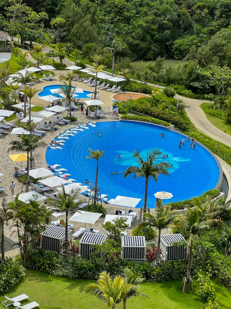 Lagoon-style pool at Halekulani Okinawa surrounded by tropical