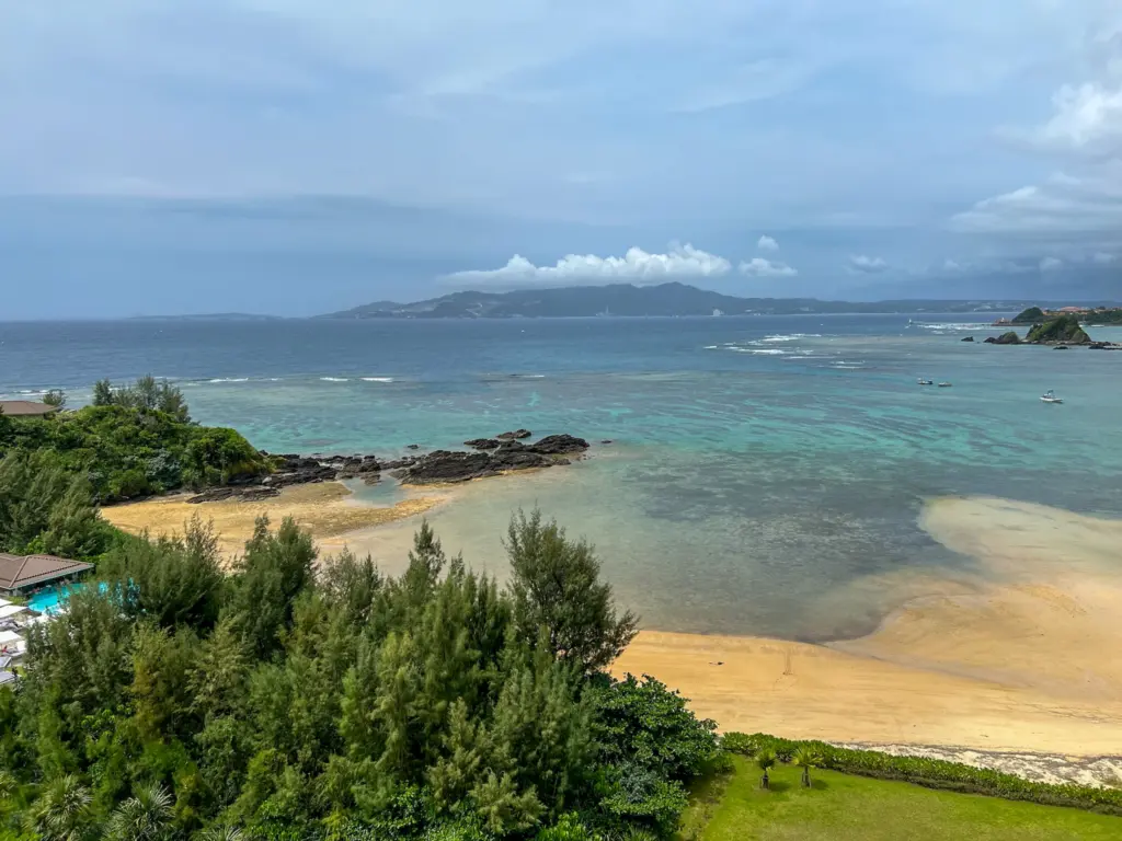 Emerald ocean view and sandy beach from Halekulani Okinawa